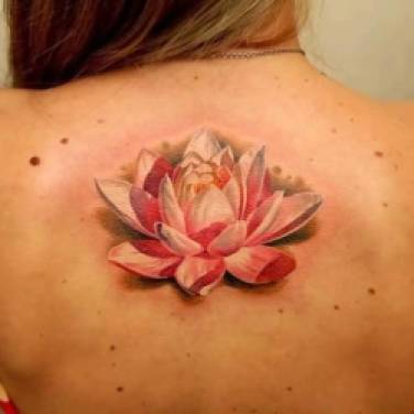 Brilliant 3D Flower Tattoo On Upper Back For Attractive Women