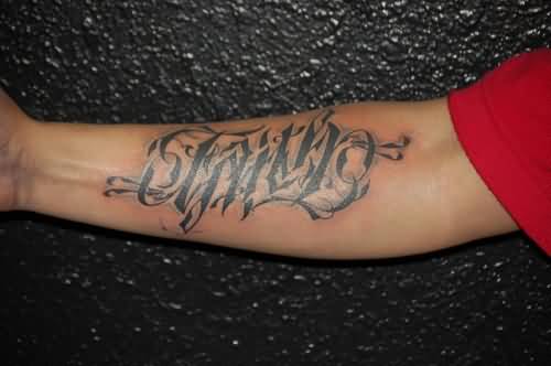 Nicki Minajs Tattoos  Lettering Tattoo on Upper Arm  Pretty Designs
