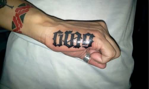 word tattoos on side of hand