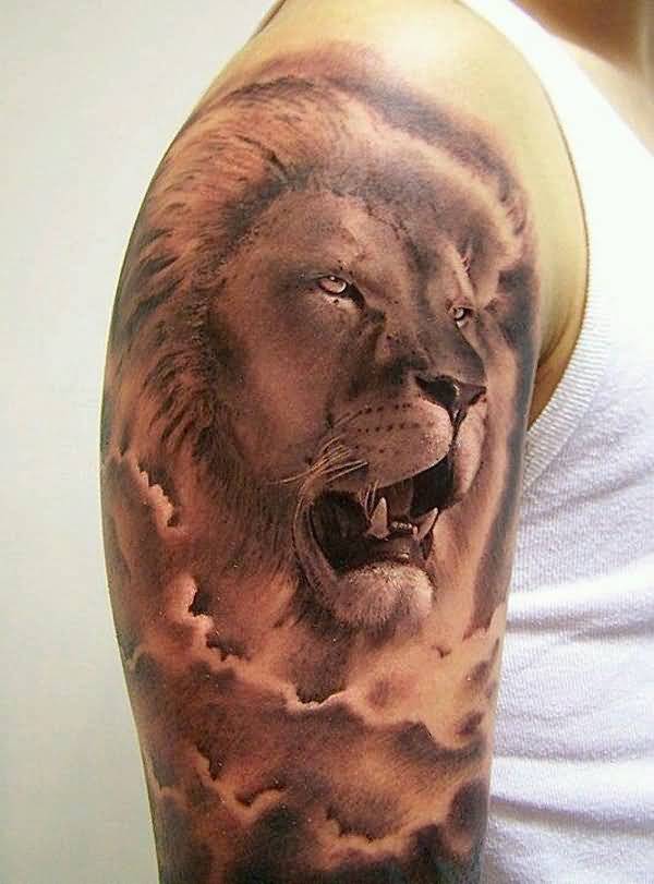 Men Show Sweet Cool African Lion Face Tattoo On Upper Sleeve