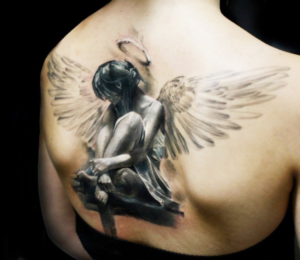 Big Wings Sad Angel Girl Tattoo On Upper Back